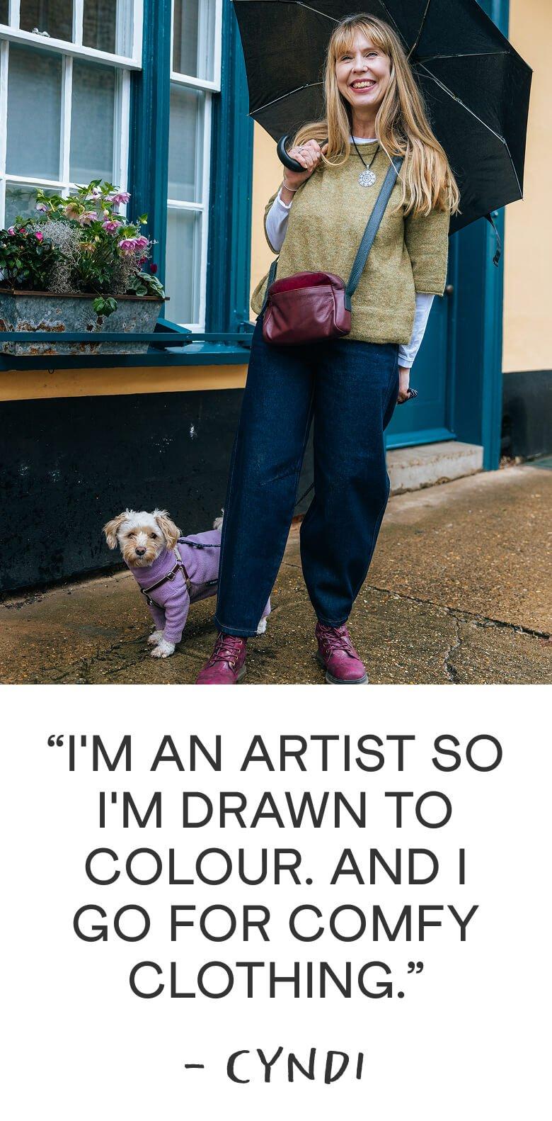 a woman with an umbrella and a dog standing next to her